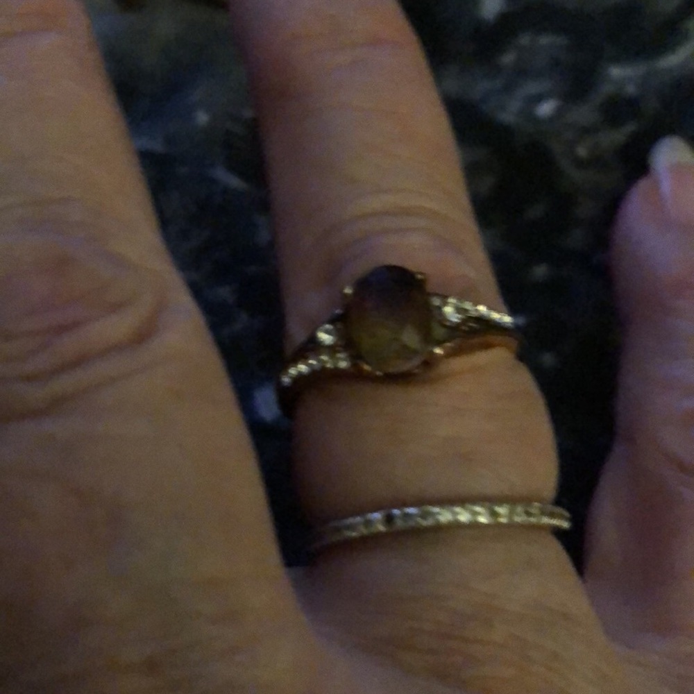Ring not sure metal with brown stone